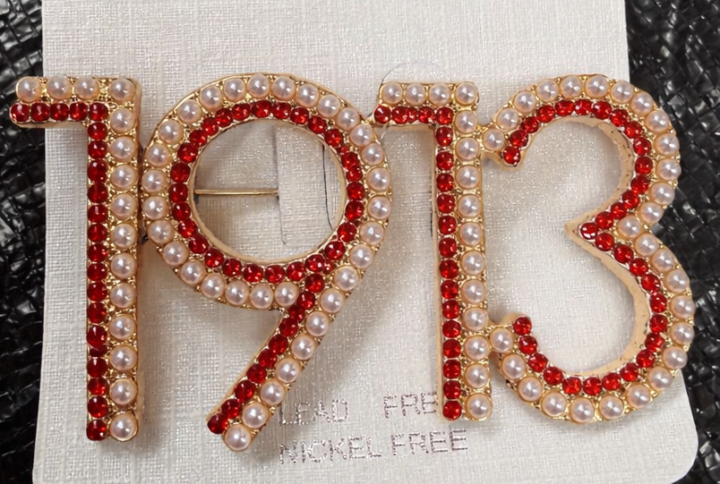 Jewelry with '1913' design on a Shopsmilees Custom Creations card.