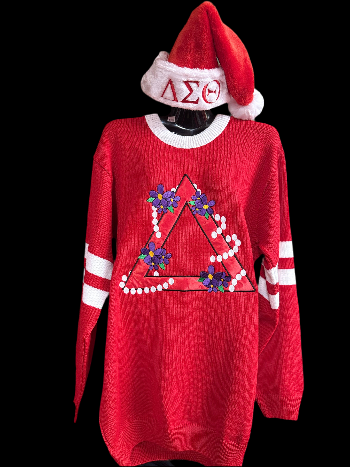 Red knit pyramid sweater. Adorned with purple violets and pearls