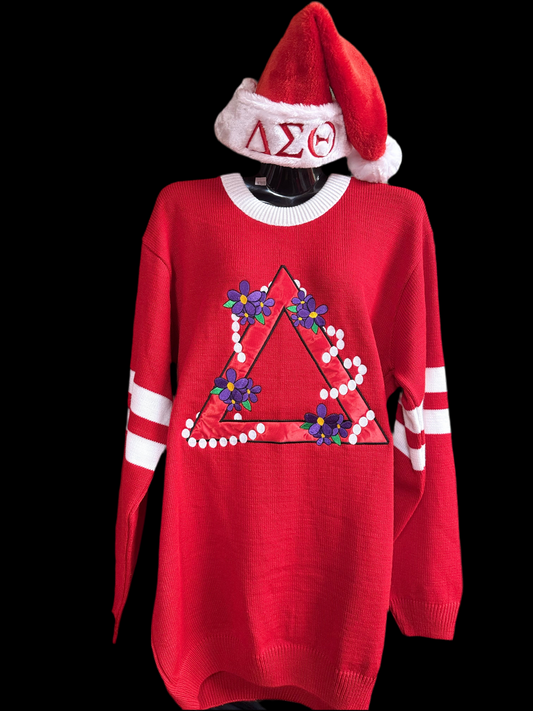 Red knit pyramid sweater. Adorned with purple violets and pearls